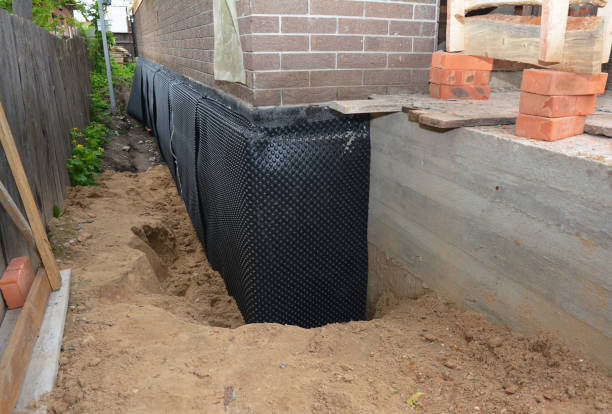 Happy homeowners after waterproofing job in Souderton
